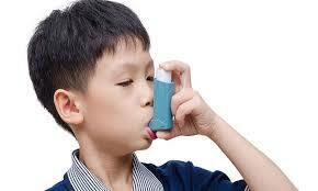 kid with inhaler